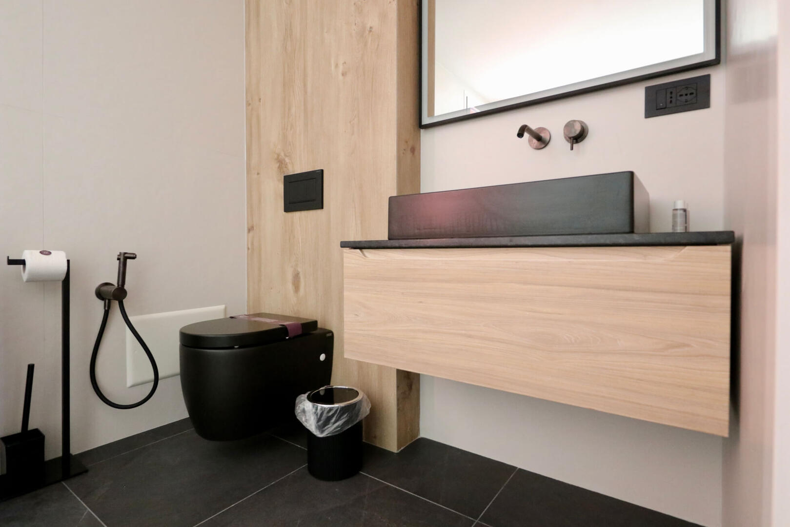 All fixtures are of high-quality in this spacious bathroom.